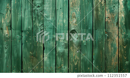 Green wooden texture closeup shot. Wooden boards of natural painted green wooden color with knots and grains in vertical Green wooden texture closeup shot. Wooden boards of natural painted green wooden color with knots and grains in vertical 112351557