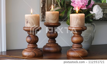 Elegant handmade wooden candlesticks. A small creative project made from reclaimed wood. DIY. 112351721