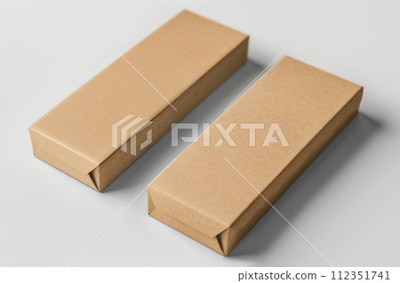 Two minimalist plain brown cardboard packaging boxes on clean white surface. Zero waste, eco friendly concept. 112351741