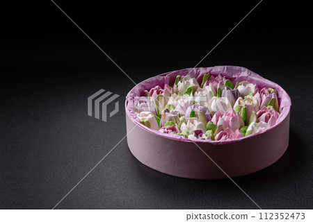 Beautiful tasty marshmallows in the form of tulip buds 112352473