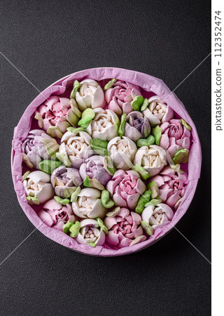 Beautiful tasty marshmallows in the form of tulip buds 112352474