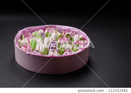 Beautiful tasty marshmallows in the form of tulip buds Beautiful tasty marshmallows in the form of tulip buds 112352482