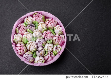 Beautiful tasty marshmallows in the form of tulip buds 112352483