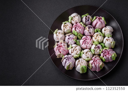 Beautiful tasty marshmallows in the form of tulip buds Beautiful tasty marshmallows in the form of tulip buds 112352550