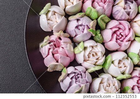 Beautiful tasty marshmallows in the form of tulip buds 112352553