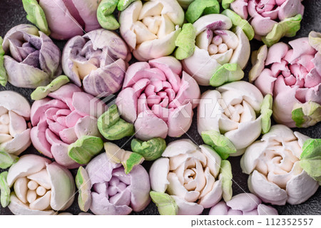 Beautiful tasty marshmallows in the form of tulip buds Beautiful tasty marshmallows in the form of tulip buds 112352557