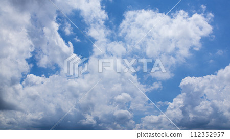 Many clouds flowing in the summer blue sky 112352957