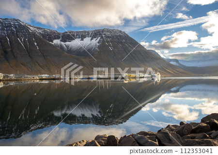 Fjord, mountains, port and cloudy sky, Iceland 112353041