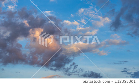 Many clouds flowing in the blue sky in the evening Many clouds flowing in the blue sky in the evening 112353301