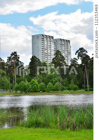 Multi-storey residential buildings on shore of Shkolnoye Lake in Zelenograd in Moscow, Russia 112353469