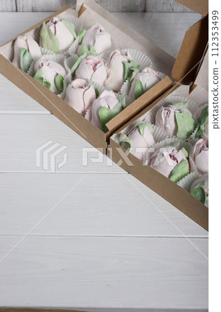 Marshmallows in gift boxes. Marshmallow flowers. Homemade marshmallows. 112353499