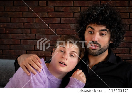 Casual Couple's Moment of Surprise  112353571