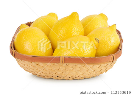 Ripe lemons in wicker basket isolated on white background 112353619