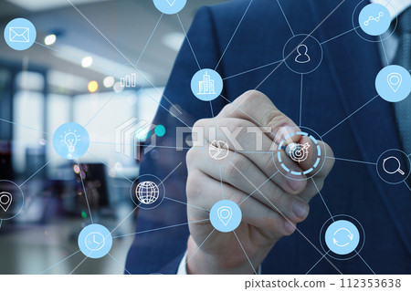 Businessman draws the structure of business goals. Businessman draws the structure of business goals. 112353638