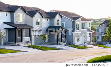 Nestled in a planned suburban development in Colorado, new construction houses stand proudly, showcasing modern architecture and promising a vibrant community for residents. 112353895