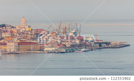 Panorama of Lisbon historical center terreiro do paco aerial timelapse. Floating ships at ferry terminal 112353902