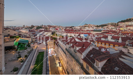 Panorama showing Alfama and Baixa districts of Lisbon aerial day to night timelapse, Portugal 112353913