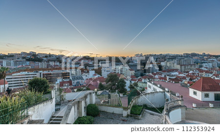 Panorama showing Jardim do Torel day to night timelapse with views to the city center of Lisbon after sunset. Portugal 112353924