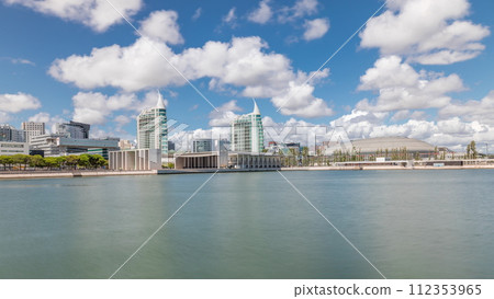 Panorama showing Parque das Nacoes or Park of Nations district timelapse in Lisbon, Portugal. 112353965
