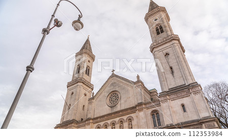 The Catholic Parish and University Church St. Louis, called Ludwigskirche timelapse in Munich. Germany The Catholic Parish and University Church St. Louis, called Ludwigskirche timelapse in Munich. Germany 112353984