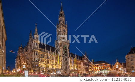 Marienplazt Old Town Square with New Town Hall day to night timelapse hyperlapse. Bavaria, Germany Marienplazt Old Town Square with New Town Hall day to night timelapse hyperlapse. Bavaria, Germany 112354035