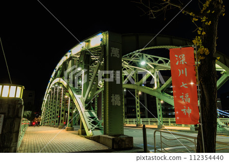 Tokyo, Koto-ku, Kiyosumi, night view of Mannenbashi Bridge spanning the Onagigawa River 112354440
