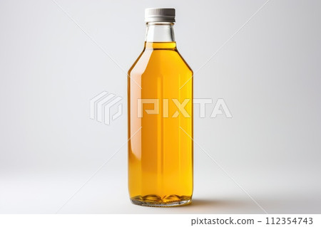 Plastic bottle of fresh apple juice on white background isolated Plastic bottle of fresh apple juice on white background isolated 112354743