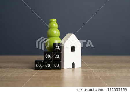 House and CO2 metric cubes. Energy efficiency. Reduce a homes carbon footprint and energy consumption. 112355169