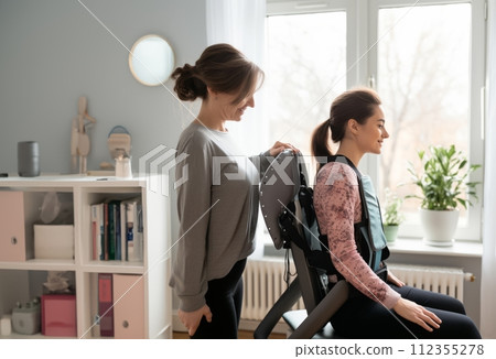 AI-generated content. Compassionate Home Visit: Doctor Attends to Patient in Wheelchair with Broken Neck.Generated image AI-generated content. Compassionate Home Visit: Doctor Attends to Patient in Wheelchair with Broken Neck.Generated image 112355278