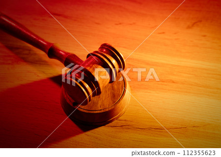 Wooden gavel on table, law concept 112355623