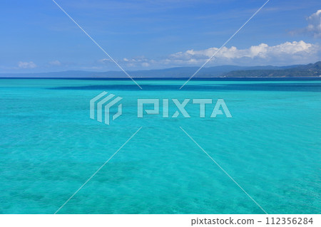 Nakijin Village, Kunigami District, Okinawa Prefecture/Nago City, Kouri Blue Sea seen from Kouri Ohashi Bridge, which connects Okinawa Main Island and Kouri Island Nakijin Village, Kunigami District, Okinawa Prefecture/Nago City, Kouri Blue Sea seen from Kouri Ohashi Bridge, which connects Okinawa Main Island and Kouri Island 112356284