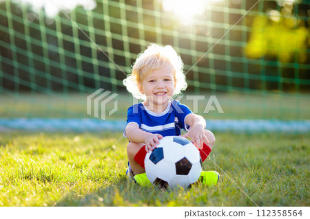 France football fan kids. Children play soccer. 112358564