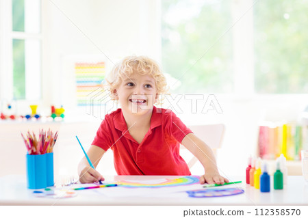 Kids paint. Child painting. Little boy drawing. Kids paint. Child painting. Little boy drawing. 112358570