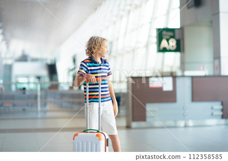 Family in airport. Kids fly. Travel with child. Family in airport. Kids fly. Travel with child. 112358585
