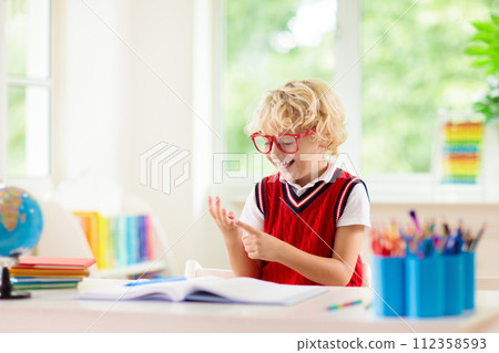 Kids doing homework. Children go back to school. Kids doing homework. Children go back to school. 112358593