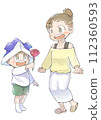 A scene in which a boy wearing an origami helmet presents a carnation to his mother. 112360593