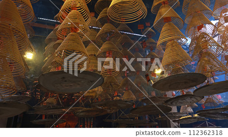 large amount of incense coils at the top of hong kong Chinese taoist temple	 112362318