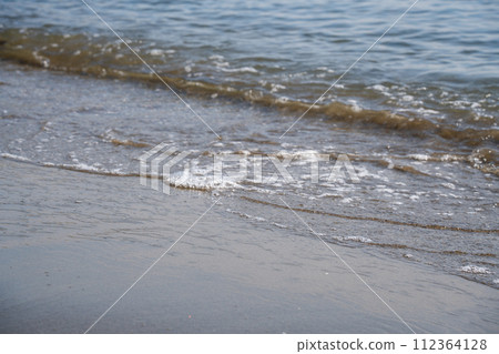 Sandy beach wave 010 112364128