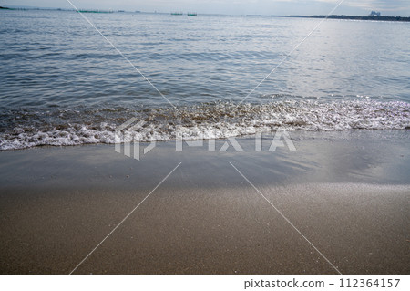 Sandy beach wave 015 112364157