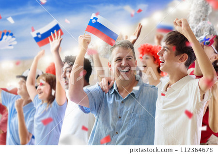 Slovenia football team supporter on stadium. 112364678