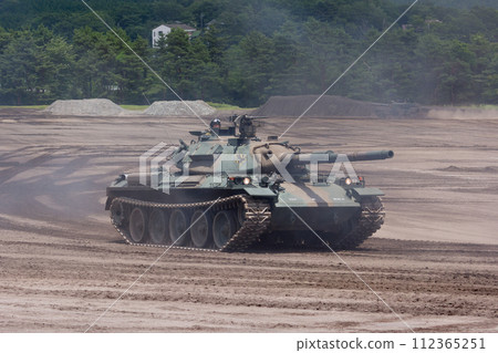 Ground Self-Defense Force Type 74 tank running Ground Self-Defense Force Type 74 tank running 112365251