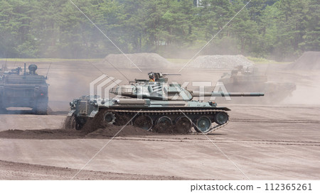 Ground Self-Defense Force Type 74 tank running Ground Self-Defense Force Type 74 tank running 112365261