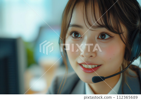 "AI-generated image" of a young female operator wearing a headset in the office 112365689