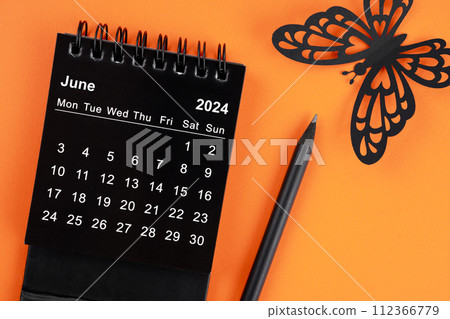 June 2024 desk calendar for the organizer to plan and reminder and butterfly paper. 112366779