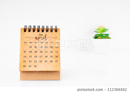 April 2024 Monthly desk calendar for 2024 year with plant pot. 112366882