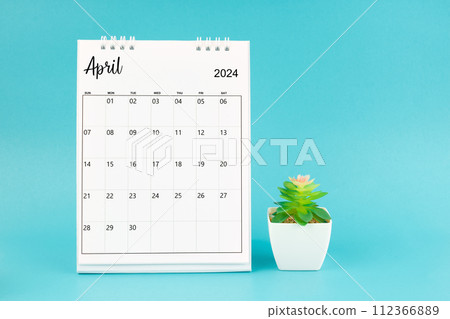 2024 April desk calendar and plant pot. 2024 April desk calendar and plant pot. 112366889