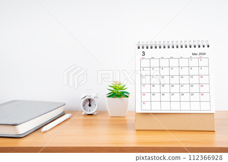 March 2024, Monthly desk calendar for 2024 year on wooden table. 112366928