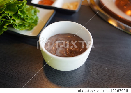 Red bean porridge is a porridge dish made with red beans as the main ingredient, and exists in various forms in various countries in Asia, including Korea. 112367656