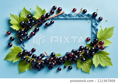 Blue background with black currants. Blue background with black currants. 112367809