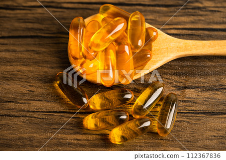 Fish oil Omega 3 capsules vitamin with EPA and DHA isolated on white background. 112367836